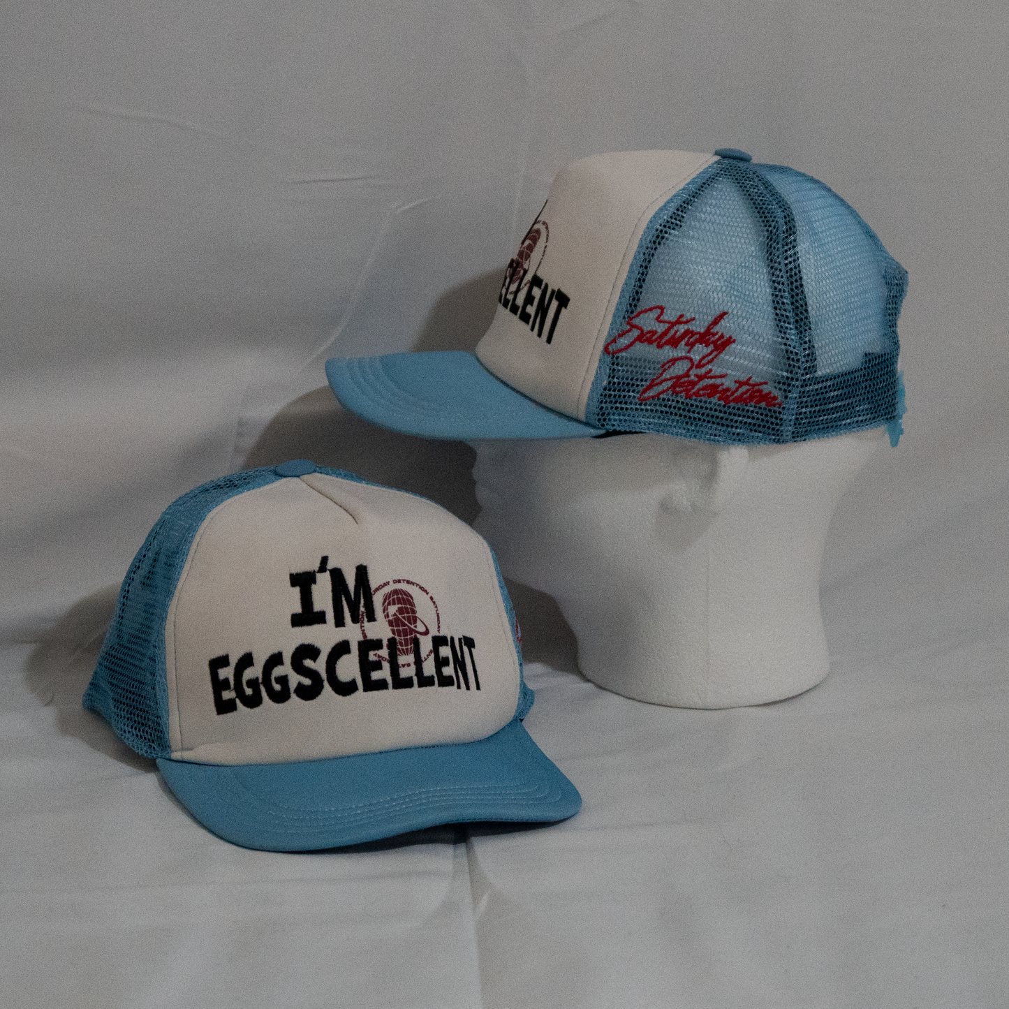'IM EGGSCELENT' TRUCKER HAT